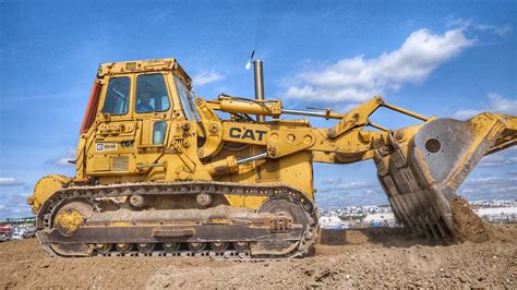 large track loader|largest cat track loader.